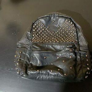 Black studded motorcycle backpack